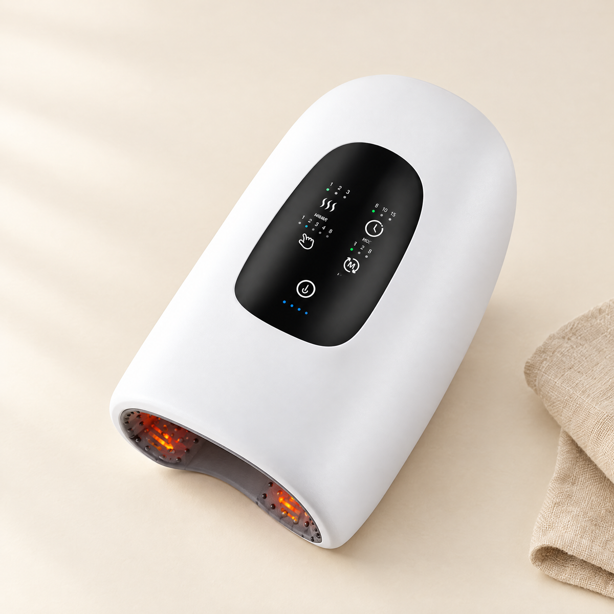Heated hand massager on cream background