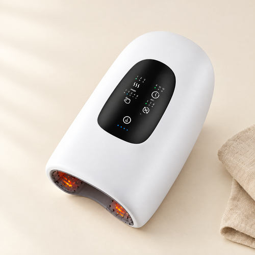 Heated hand massager on cream background