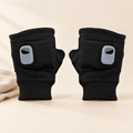 Heated fingerless gloves on cream background